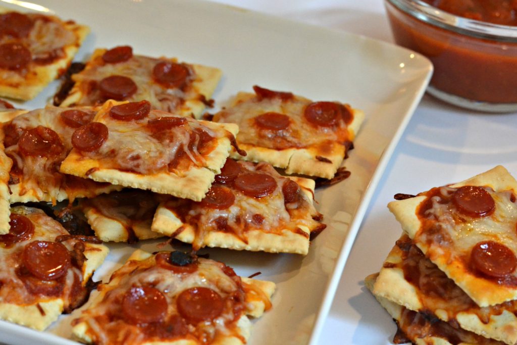 Cracker Pizzas! Perfect after school snack. Easy and delicious snacks.