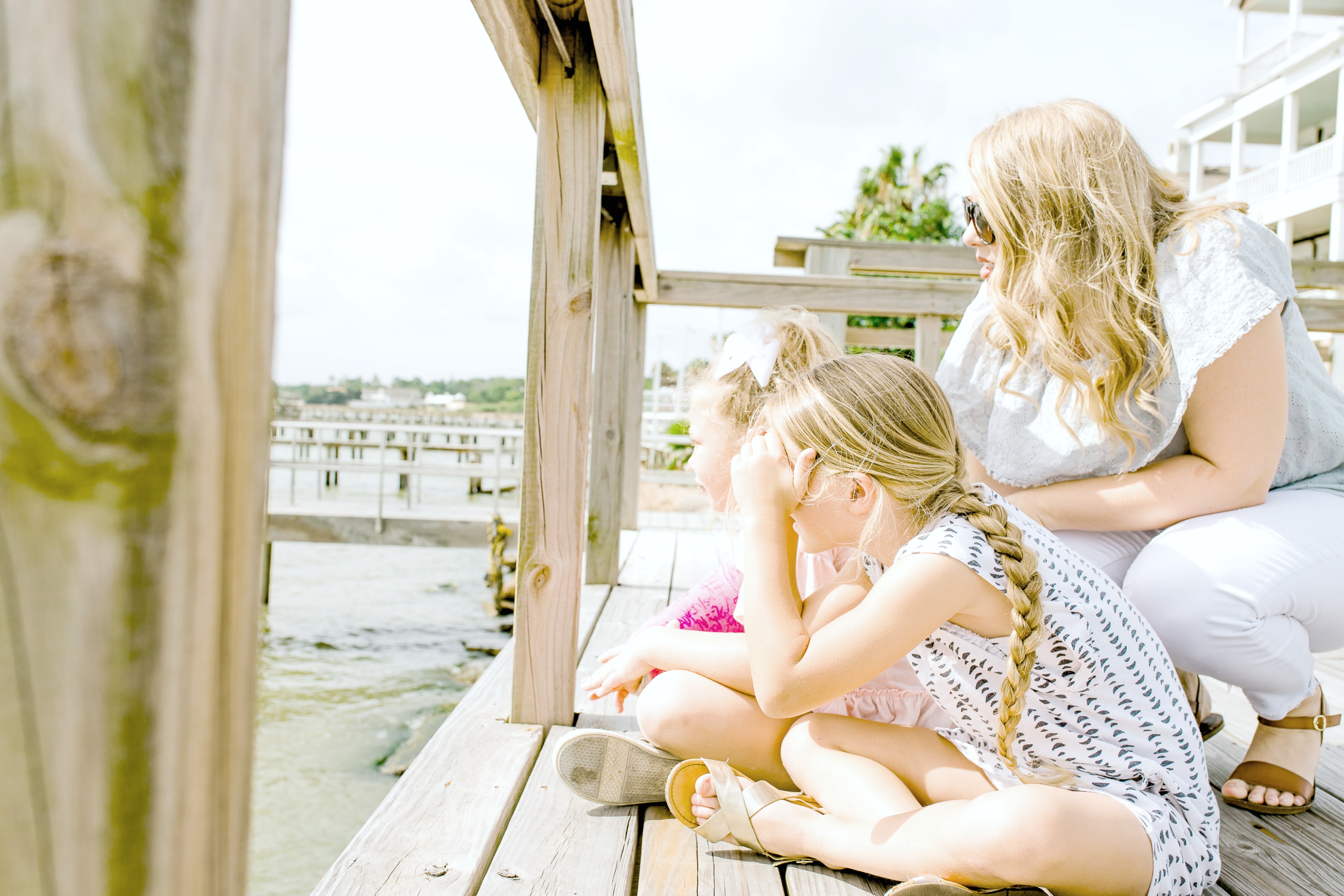 Mom and Daughters on the Dock in the Summer